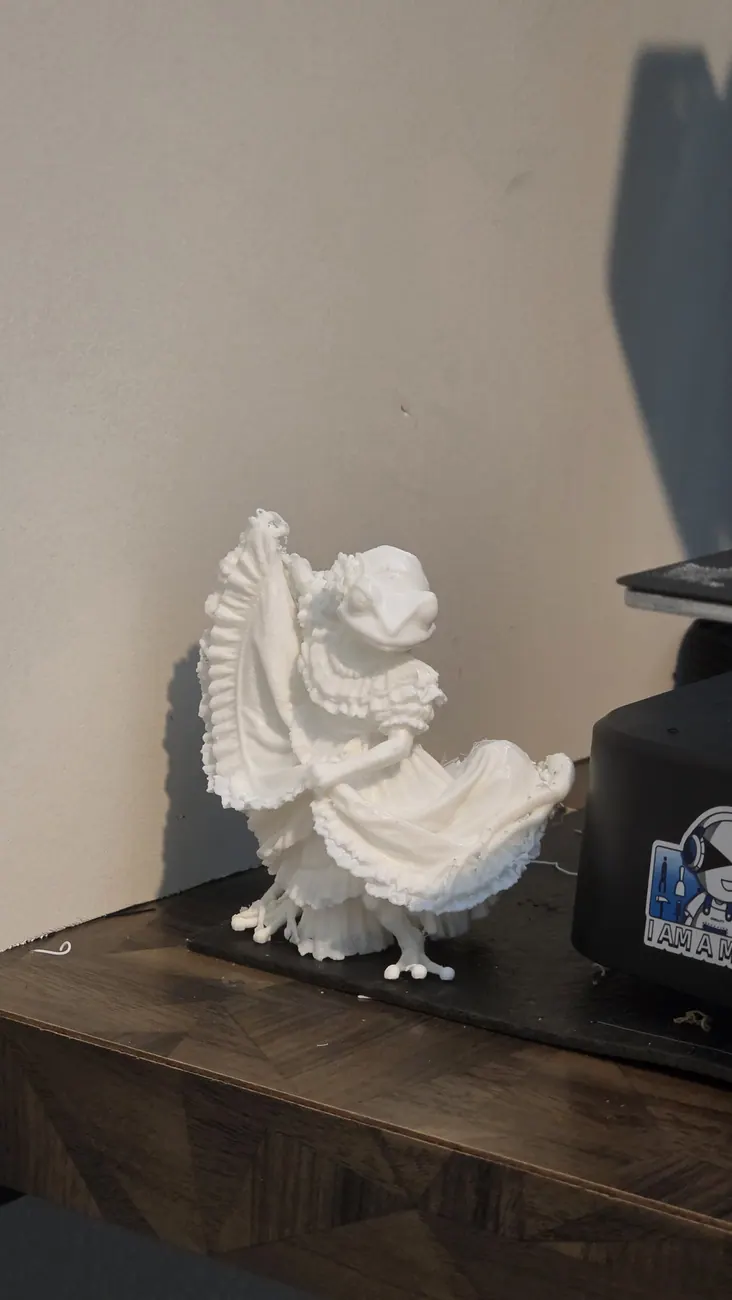 White sculptural miniature figure from the studio