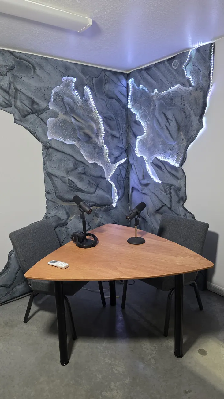 Fabricated tree-trunk prop table with sculpted bark texture